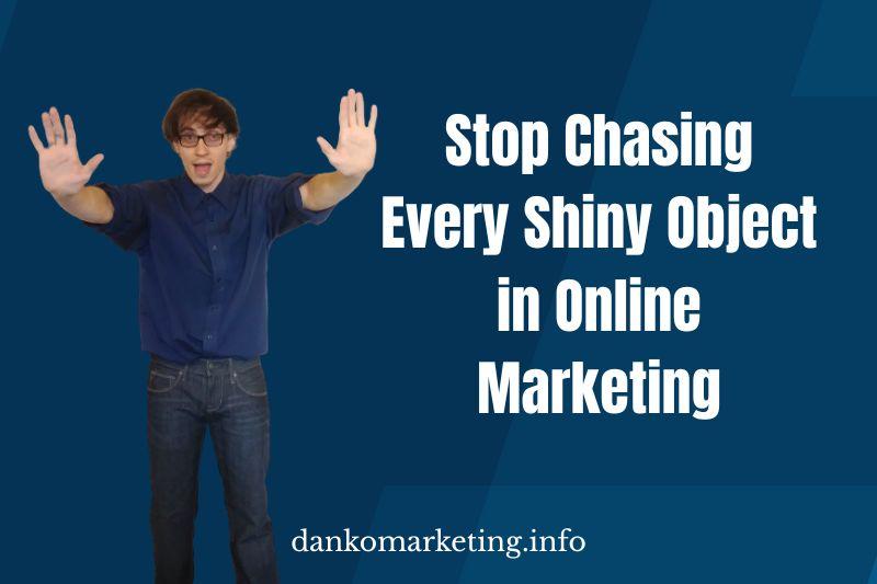 Man with hands up against blue background, promoting focus in online marketing.